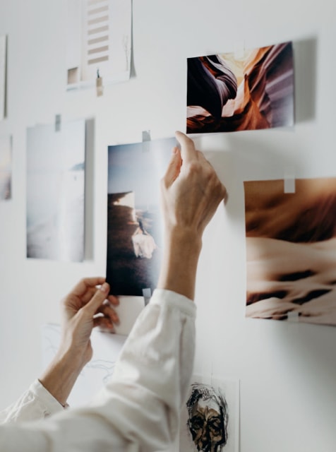 Woman putting image on board